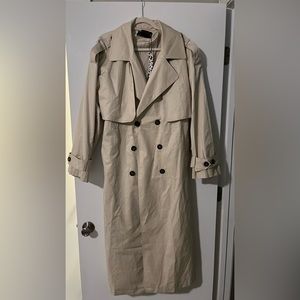 Extremely long longed, maxi cream ASOS trench coat.